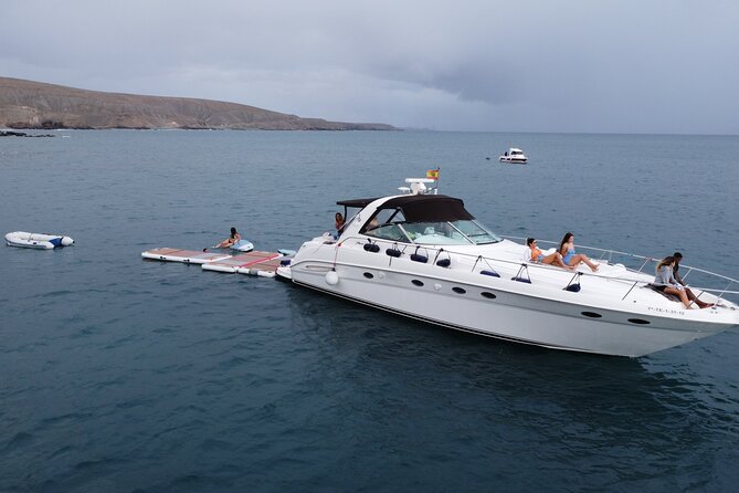 4 Hour Boat Tour with Snorkeling from Puerto Rico and Mogan - Stop One: Playa Taurito for a simple, local beach break