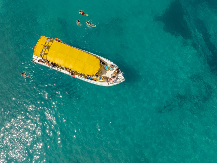 Alcudia: Coll Baix Beach & Sea Caves Cruise with Snorkeling - Getting to the Water: Hotel Pickup in Alcúdia and the Short Coach Ride