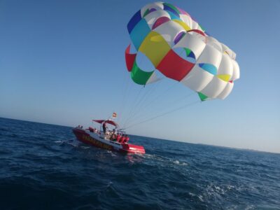 Alicante: Boat Trip and Parasailing Experience with Drink - Aboard the Boat: music time, photo focus, and how the crew runs it