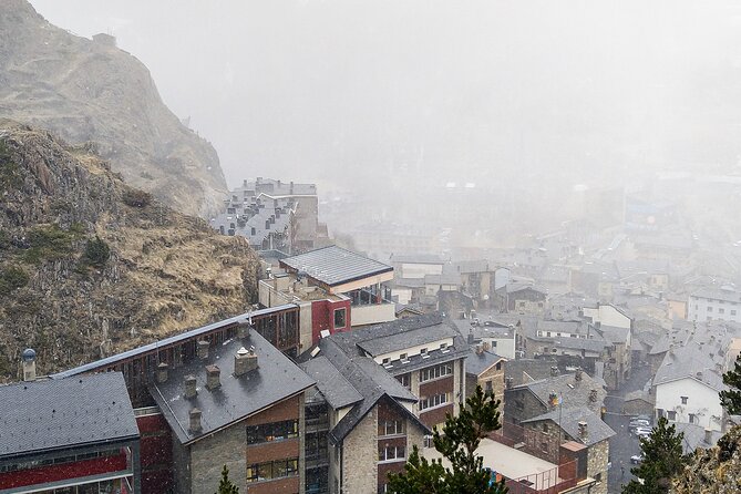 Andorra, France & Spain: 3 Countries in One Day from Barcelona - Andorra la Vella (2 hours): Casa de la Vall, Dali’s watch, and the Meritxell shopping axis