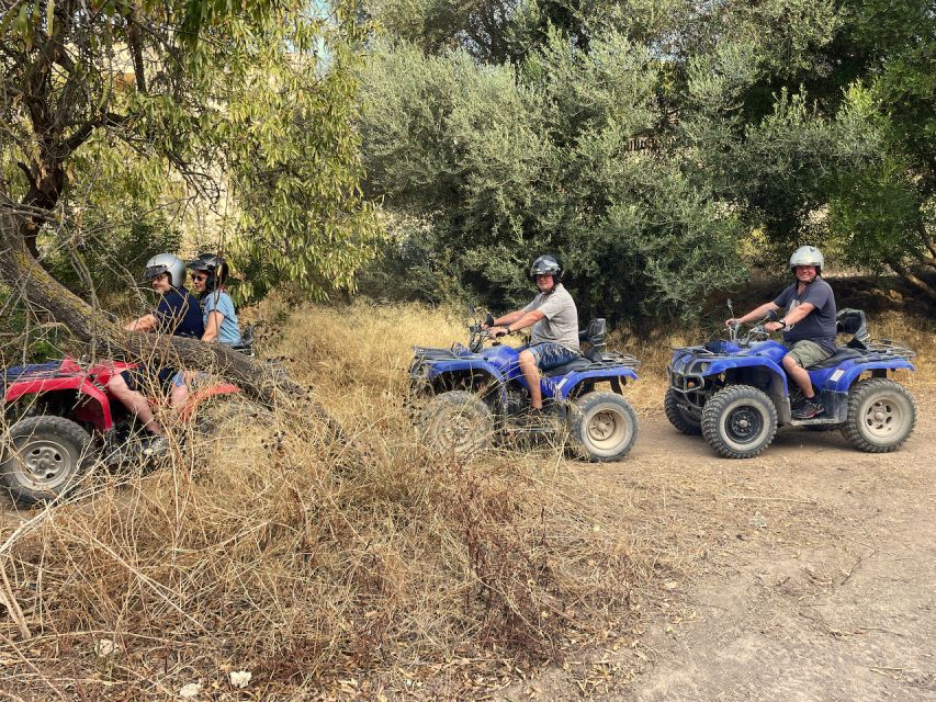 Andratx: Guided Quad Sightseeing Tour - The ATVs: automatic Yamaha Grizzlies, helmet on, focus up