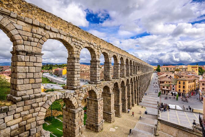 Avila and Segovia private day trip with hotel pick up from Madrid - Segovia First: Castle, Cathedral, and a Roman Aqueduct in Fast Motion