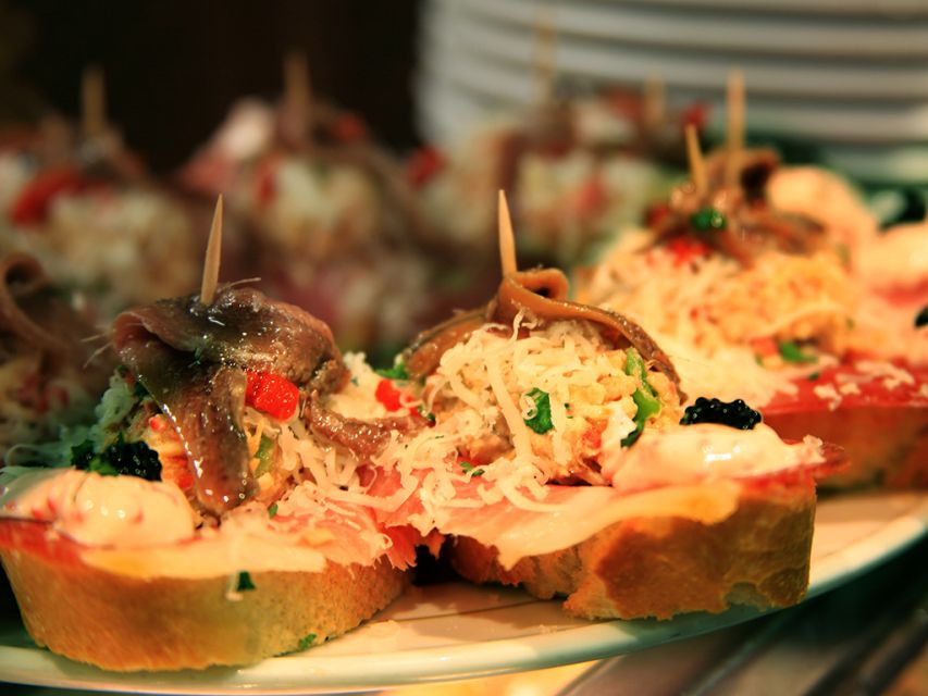 Barcelona: 4-Hour Tapas Evening Tour and Flamenco Show - La Boquería market: a must-see stop if your day fits