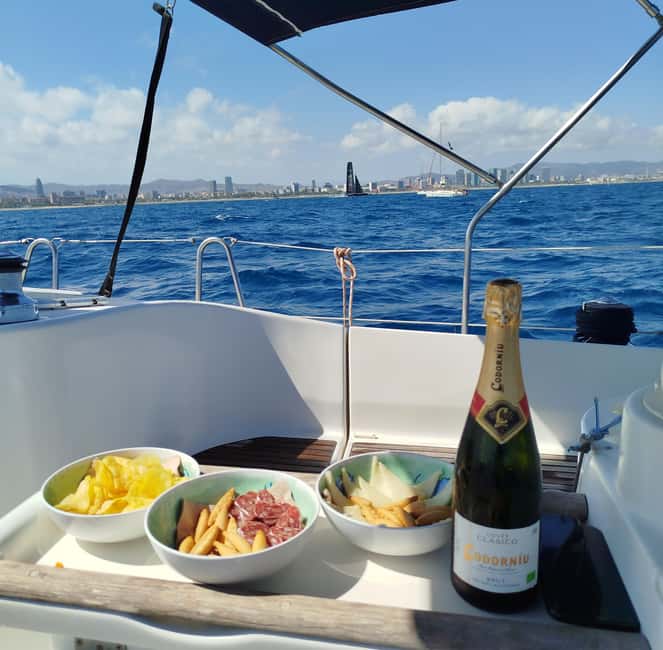 Barcelona Badalona : Sailboat Tour, Snacks, Drinks, Swimming - Key highlights worth knowing