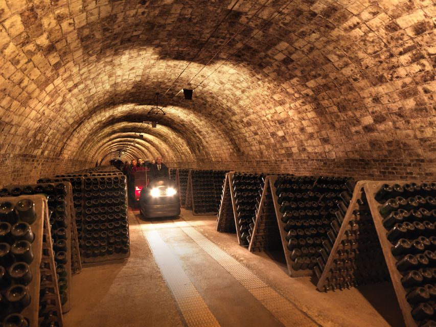 Barcelona: Casa Codorníu Guided Tour with Cava Tastings - Going 20+ meters underground by electric train