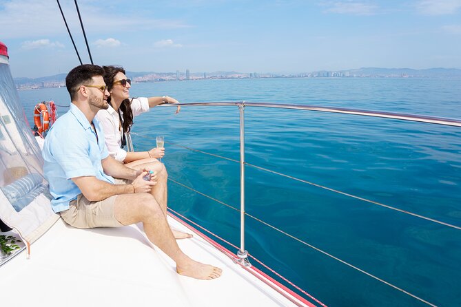 Barcelona Catamaran Cruise with Tapa & Drink Included - Welcome drink and tapa: simple, local, and designed as a snack