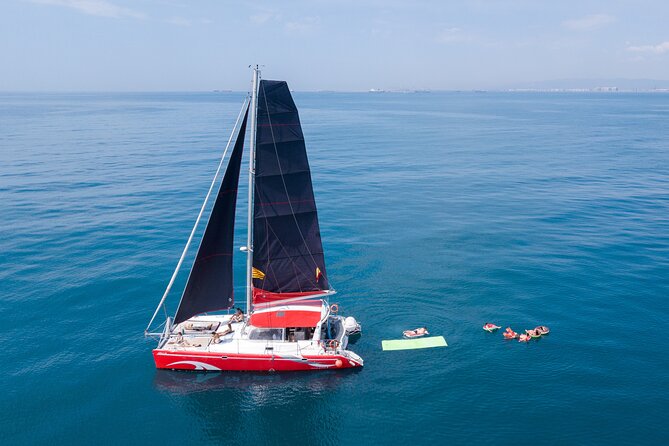 Barcelona Catamaran Cruise with Tapa & Drink Included - Daytime vs sunset: choose your vibe, not just your clock