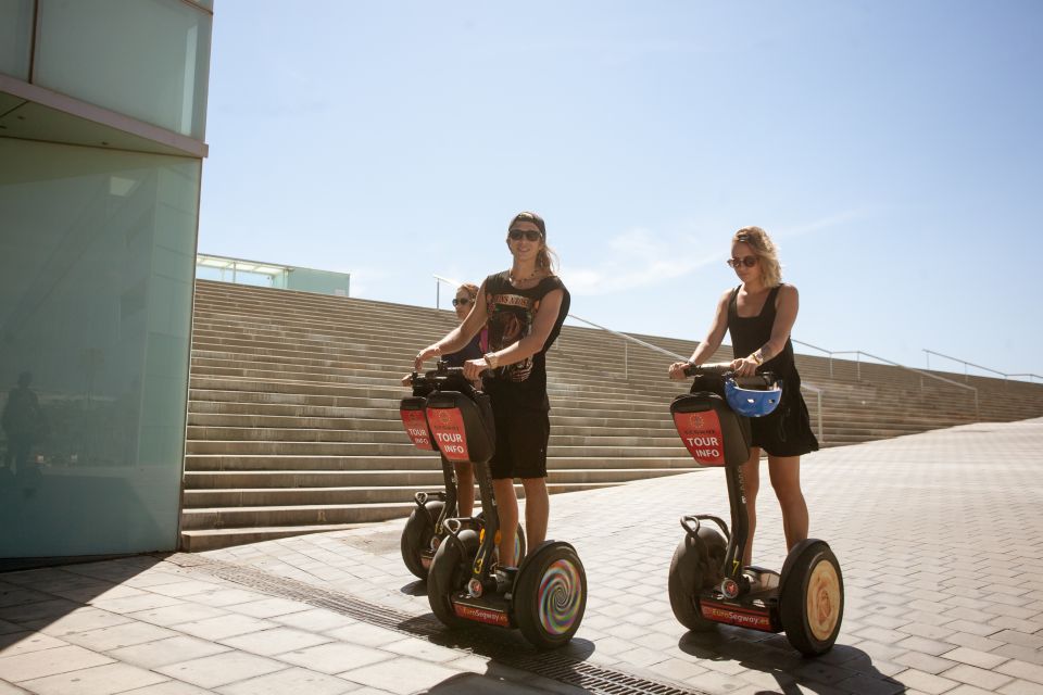 Barcelona: City Highlights Guided Segway Tour - Port Vell and Somorrostro beach: yachts, water, and a slice of the coast