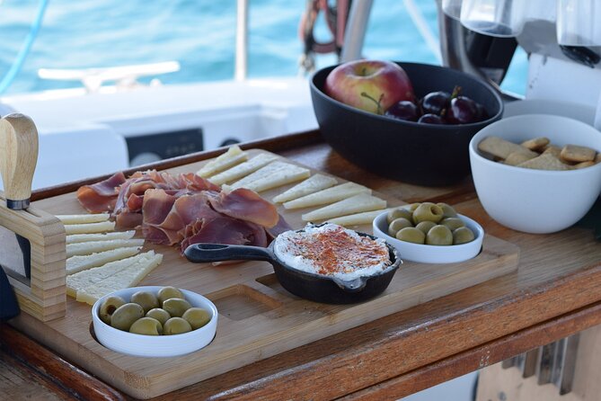 Barcelona Coastal Sailing (Open Bar, Catalan Snack & Swim Stop) - Pont del Petroli swim stop: gear included, but weather runs the show