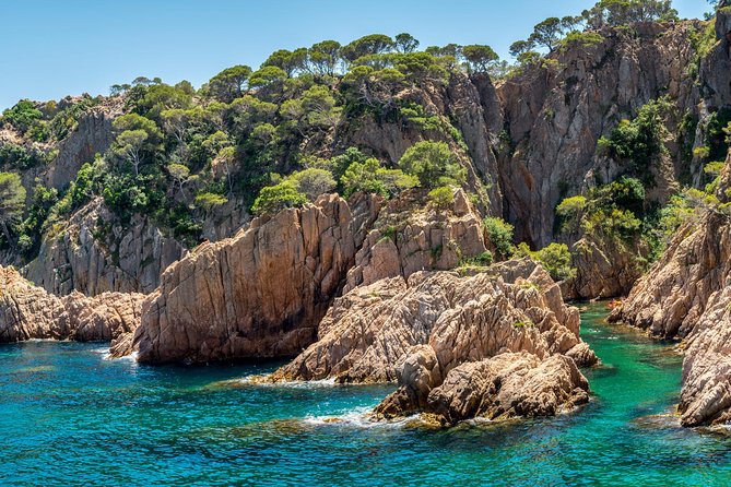 Barcelona: Costa Brava Easy Hike, Snorkel, Cliff-Jump & Meal - Noucentista architecture and the fancy vibe between beaches