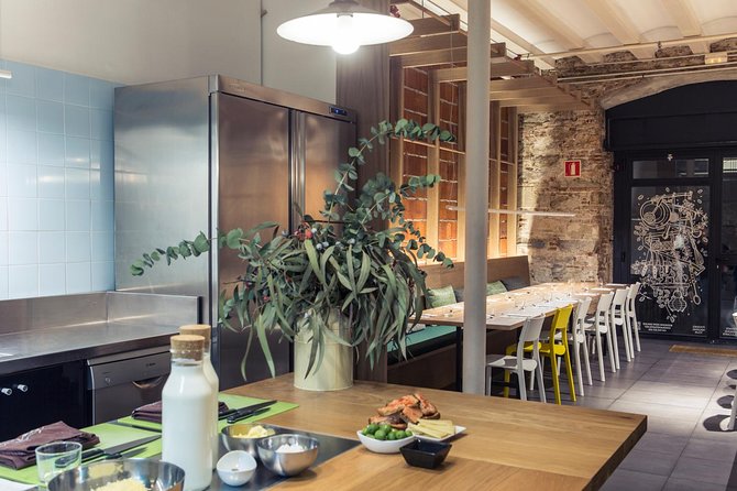 Barcelona Culinary Experience: Paella & Tapas Cooking Class - The meal moment: snacks, wine, and sitting down to eat