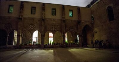 Barcelona: Dark History Night Walking Tour - How the Spanish Inquisition themes are taught with projection and headsets