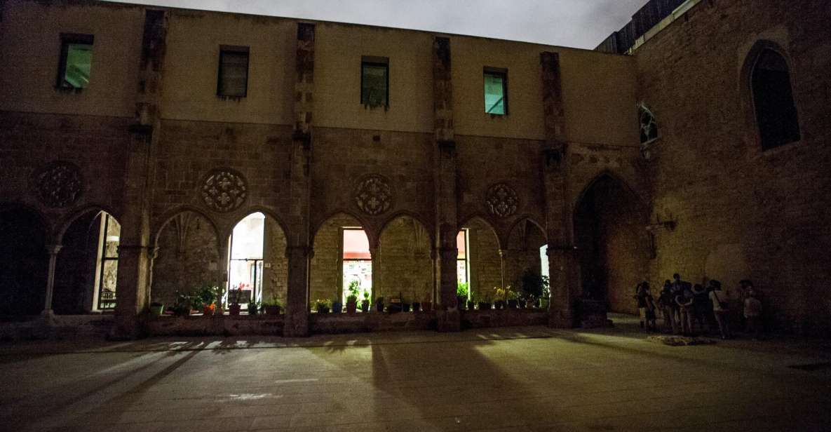 Barcelona: Dark History Night Walking Tour - How the Spanish Inquisition themes are taught with projection and headsets