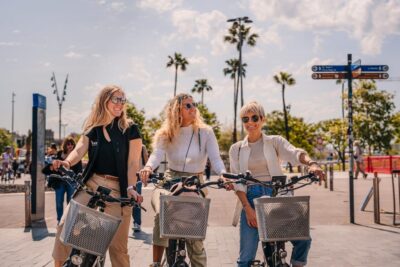 Barcelona: E-Bike Tour with Montjuic Cable Car & Boat Ride - El Raval and Paral·lel Avenue: Getting Your Bearings Fast