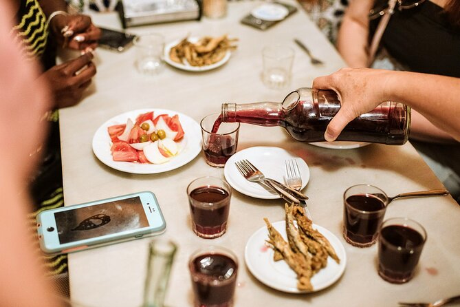 Barcelona Gothic Quarter Tapas & Taverns Food & Wine Tour - The Last Stop at an Early 20th-Century Spot: Catalan Classics, Sit-Down Pace