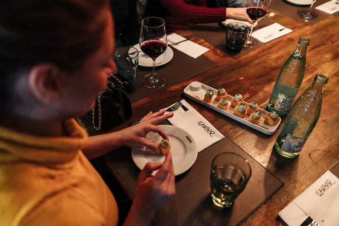 Barcelona: Guided Food Walking Tour with Tapas and Wine - Carrer Ample: your first wave of Catalan classics