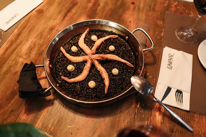 Barcelona: Guided Food Walking Tour with Tapas and Wine - Between bites: Roman walls, old lanes, and El Born window shopping