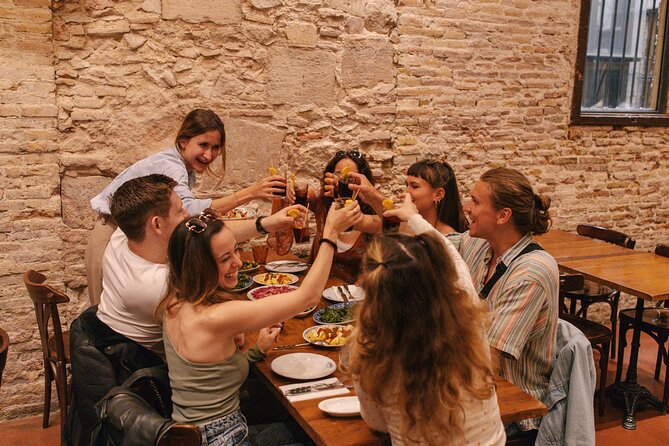 Barcelona: Guided Food Walking Tour with Tapas and Wine - Meeting at Plaça de Correus: get your timing right