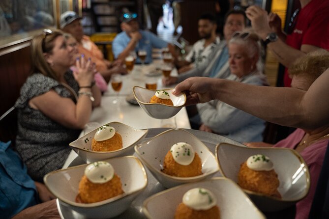 Barcelona Old Town Tapas Tour: Vermouth, Bites & Hidden Gems - Pont del Bisbe and City Hall: Legends, Photo Angles, and a Sweet Finish