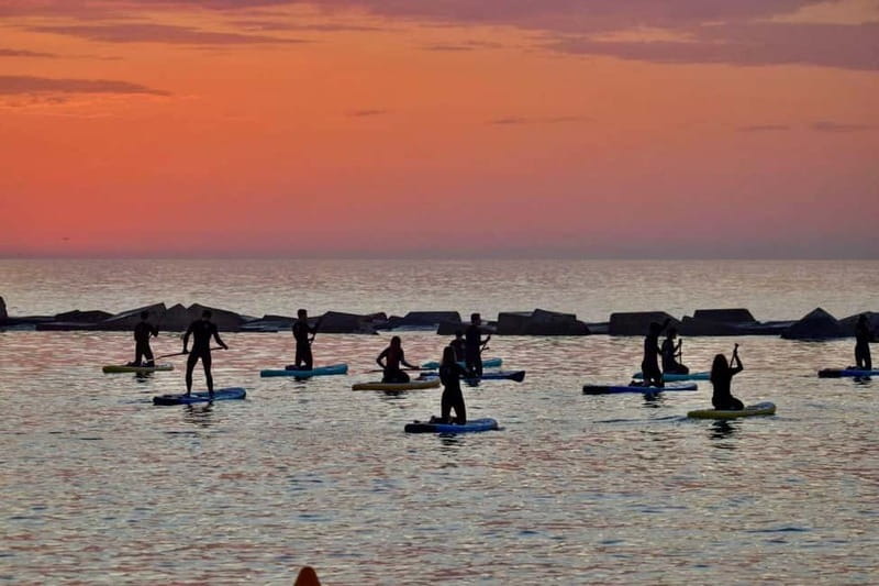 Barcelona: Paddleboarding at Sunrise. Includes: instructor, photos, equipment - Meeting at Carrer del Judici: the easy start near San Miguel beach