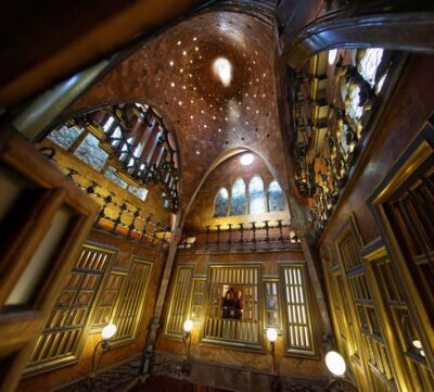 Barcelona: Palau Güell by Gaudí Entrance Ticket - Grand entrance hall: columns, woodwork, and stained glass