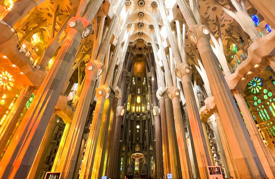 Barcelona: Park Güell & La Sagrada Familia Tickets and Tour - Park Güell: mosaic dragon, serpentine bench, and the motifs to hunt for