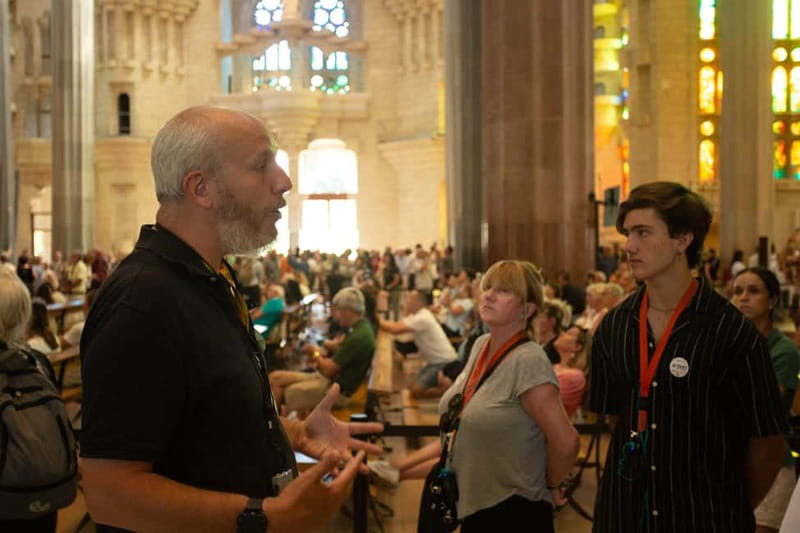 Barcelona: Sagrada Familia Skip-the-line Tour with Guide - Inside the basilica: the forest columns and stained-glass atmosphere
