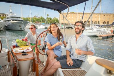 Barcelona: Sailing Tour with Spanish Tapas and Drinks - Tapas and drinks on board: eating Spanish style while sailing
