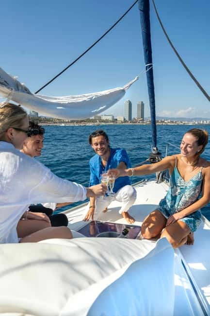 Barcelona: Sailing Tour with Young Local Captain & Drinks - Port Vell and Maremagnum: The First Look at Barcelona from Water
