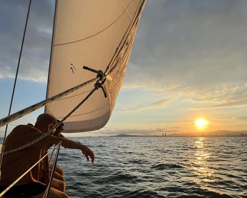 Barcelona: Sailing with Open Bar, Catalan Snack & Swim Stop - Open-bar drinks, Catalan-style snacks, and music you can shape