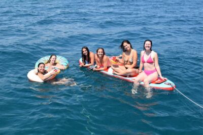 Barcelona: Sailing with Open Bar, Catalan Snack & Swim Stop - The secret swim stop: snorkeling gear, paddle boards, and water toys