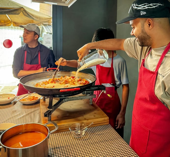 Barcelona: Seafood Paella ★Maestro★ & Tapas & Sangria - Where you meet: an intimate food space in Sarria
