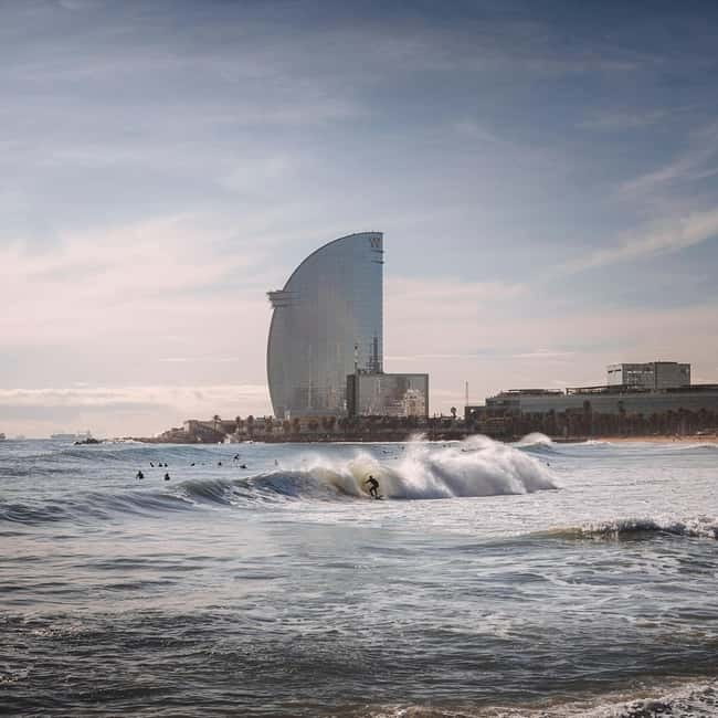 Barcelona: Sunrise or Sunset Paddle Surf with Photos - What’s included in the $53 price, and what you still need to handle
