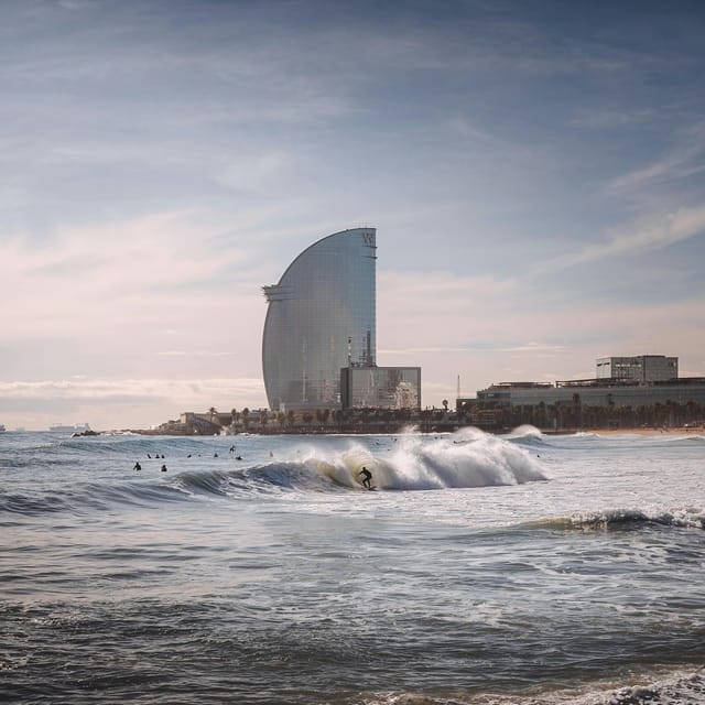 Barcelona: Sunrise or Sunset Paddle Surf with Photos - Practical logistics in Barcelona: meeting point, WhatsApp, and timing