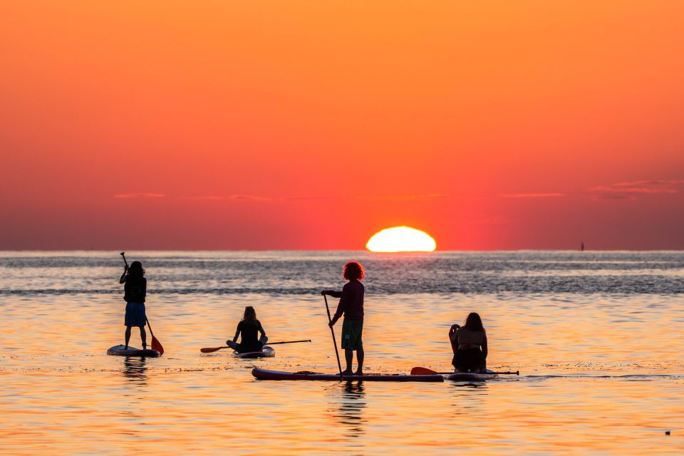 Barcelona: Sunrise Paddleboarding with Instructor and Photos - Breaks, showers, and planning the rest of your day