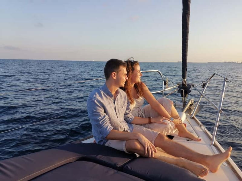 Barcelona: Sunset Sailboat Cruise with Open Bar and Snacks - Captains set the tone: what the crew does for comfort and fun