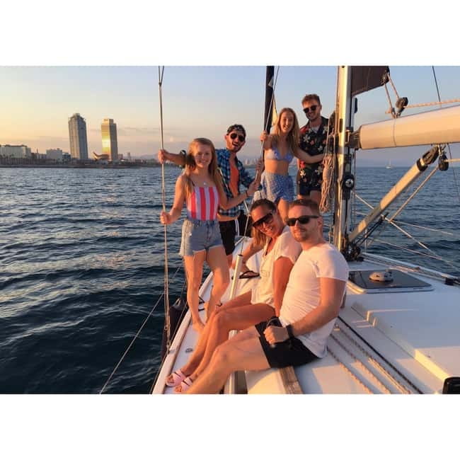 Barcelona: Sunset Skyline Cruise with Cava and Snacks - Onboard vibe: modern sailboat sailing plus a real small-group feel