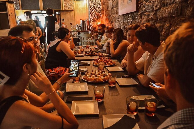 Barcelona Tapas Walking Tour: Food, Wine & History - Gothic Quarter Start at Travellers Nest Bar: Your Quick Orientation