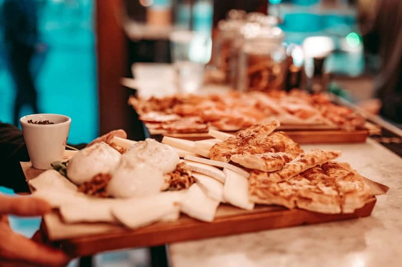 Barcelona: Tipsy Tapas & History Tour in the Gothic Quarter - Stop 3 on the way to La Rambla: live music and a laid-back finish