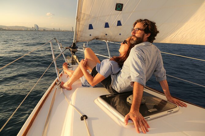 Barcelona Unique Sunset Sailing Experience with Tapas & Open Bar - Platja de la Nova Icaria pass: the coast break in the middle of the sunset