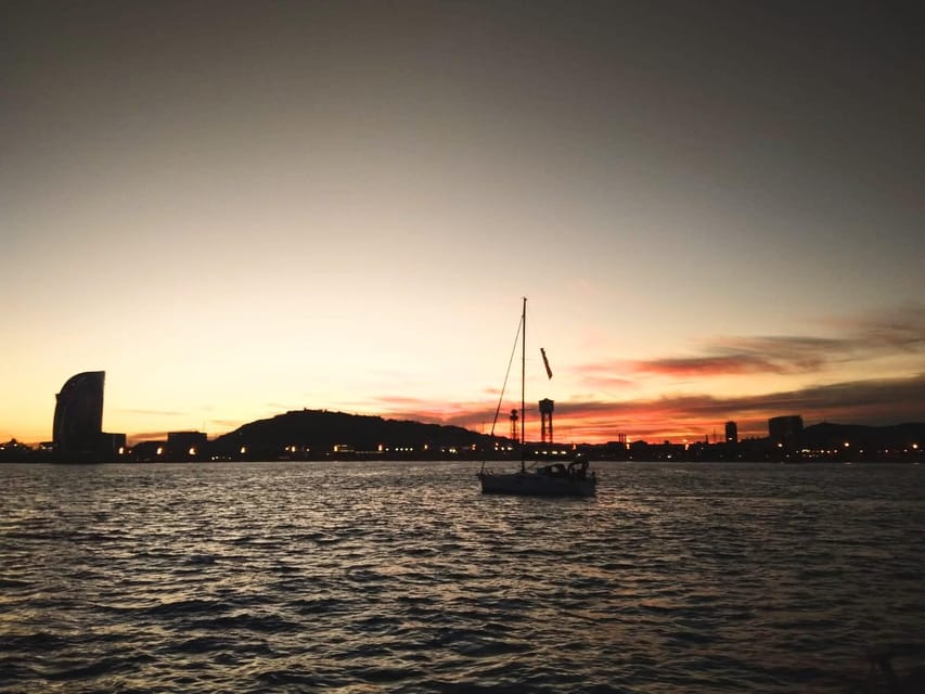 Barcelona: Unique Sunset Sailing Tour with Tapas & Open Bar - Open bar drinks: sangria, cava, wine, beer, and soft options