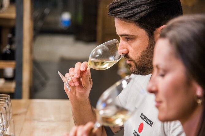 Barcelona: Wine Tasting and 5 Course Tapas Pairing Dinner - Arriving at Vivinos for an 8:00 pm tapas-and-wine flow in Ciutat Vella