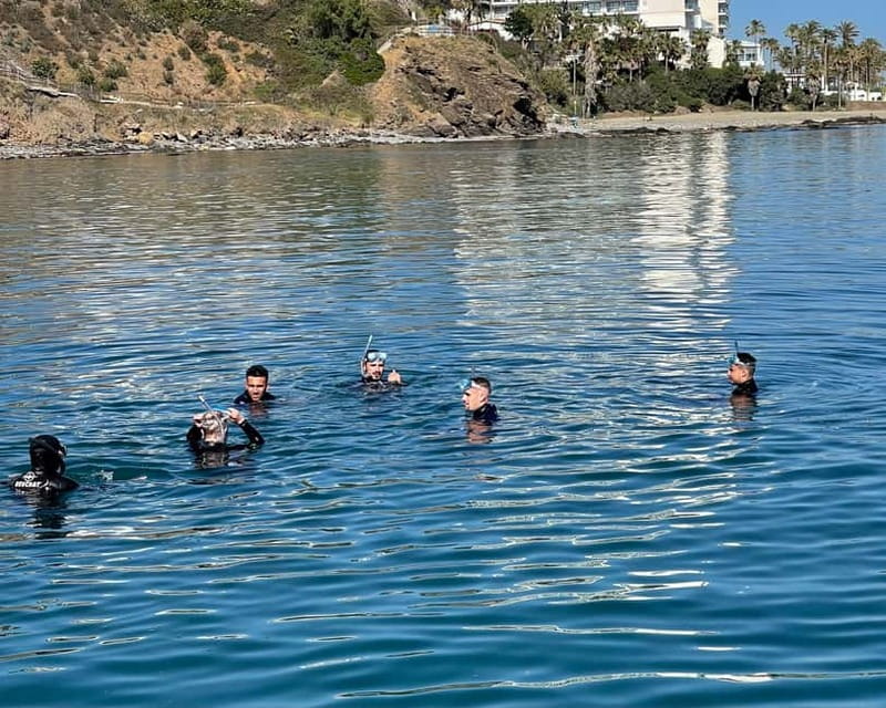 Benalmádena Boat Tour with Snorkeling, Water Slide and Lunch - The 20-foot water slide: why everyone keeps talking about it