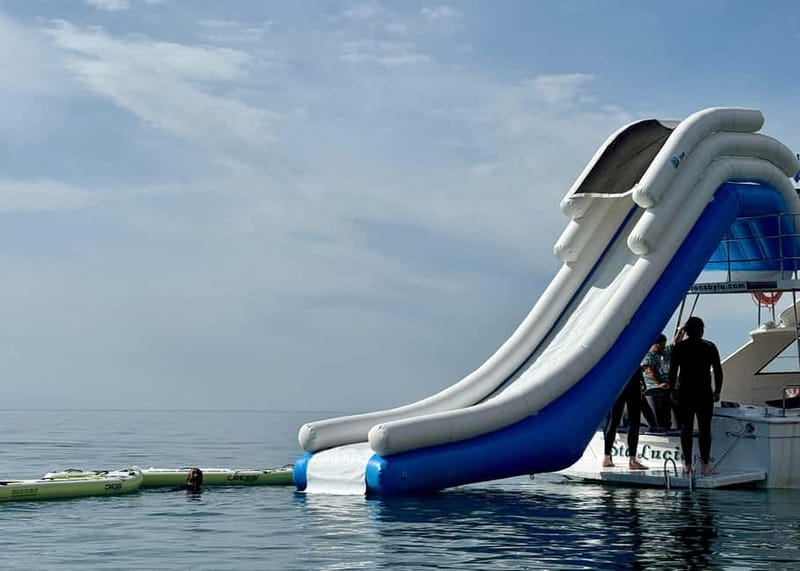 Benalmádena Boat Tour with Snorkeling, Water Slide and Lunch - Lunch on board: one sandwich with sea views (plan accordingly)