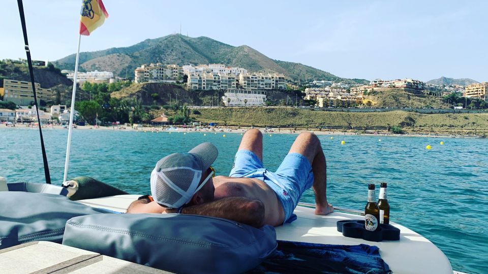 Benalmádena: Costa del Sol License-Free Boat Rental - Boat comfort details: solarium, Bluetooth music, and the included fridge