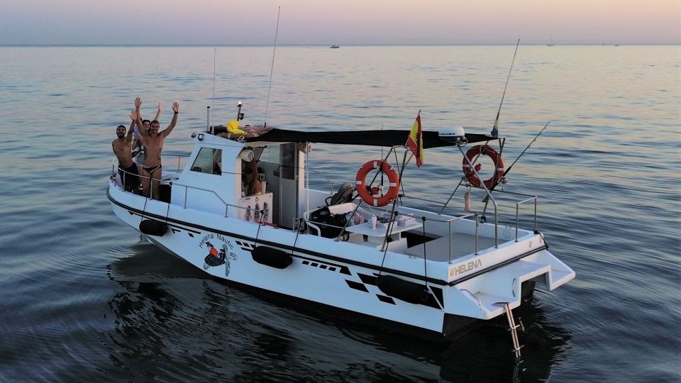 Benalmadena: Private Boat Trip – Dolphins, Drinks & Snacks - Fishing from the deck: relaxing fun, not a fishing lesson
