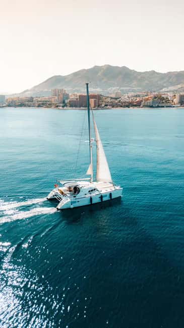 Benalmádena: Sailing & Dolphin Watching with Snacks/Drinks - Leaving Benalmádena: the coastline cruise that sets the mood