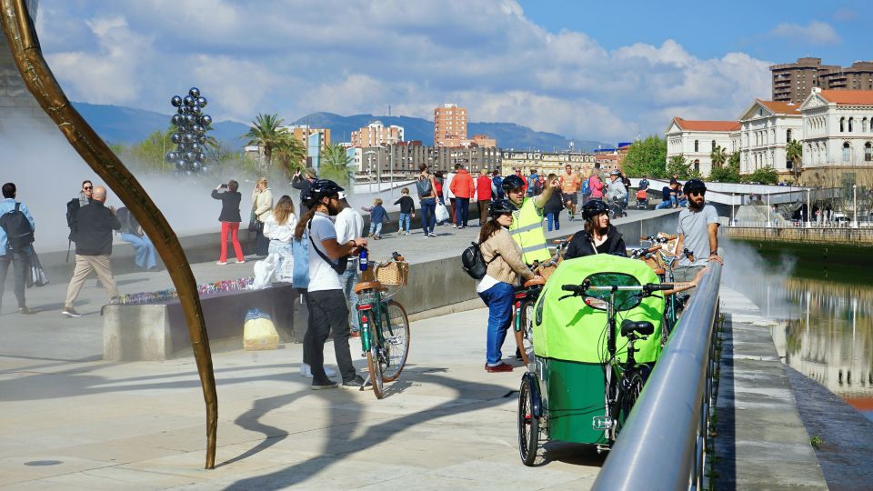 Bilbao: City Highlights Guided Bike Tour - Abandoibarra and the maritime-industrial story you can feel