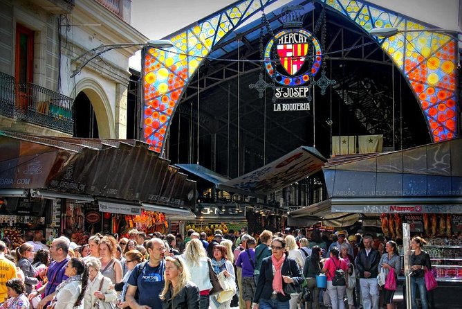 Boqueria & St Caterina Markets with Food & Tapas Small Group Tour - Stop 1: Mercat de la Boqueria for pintxos-style bites and jamón