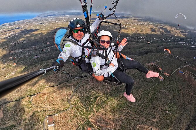 BRONZE tandem paragliding flight in South Tenerife, free pick up - The glide over the coast and the La Caleta landing moment